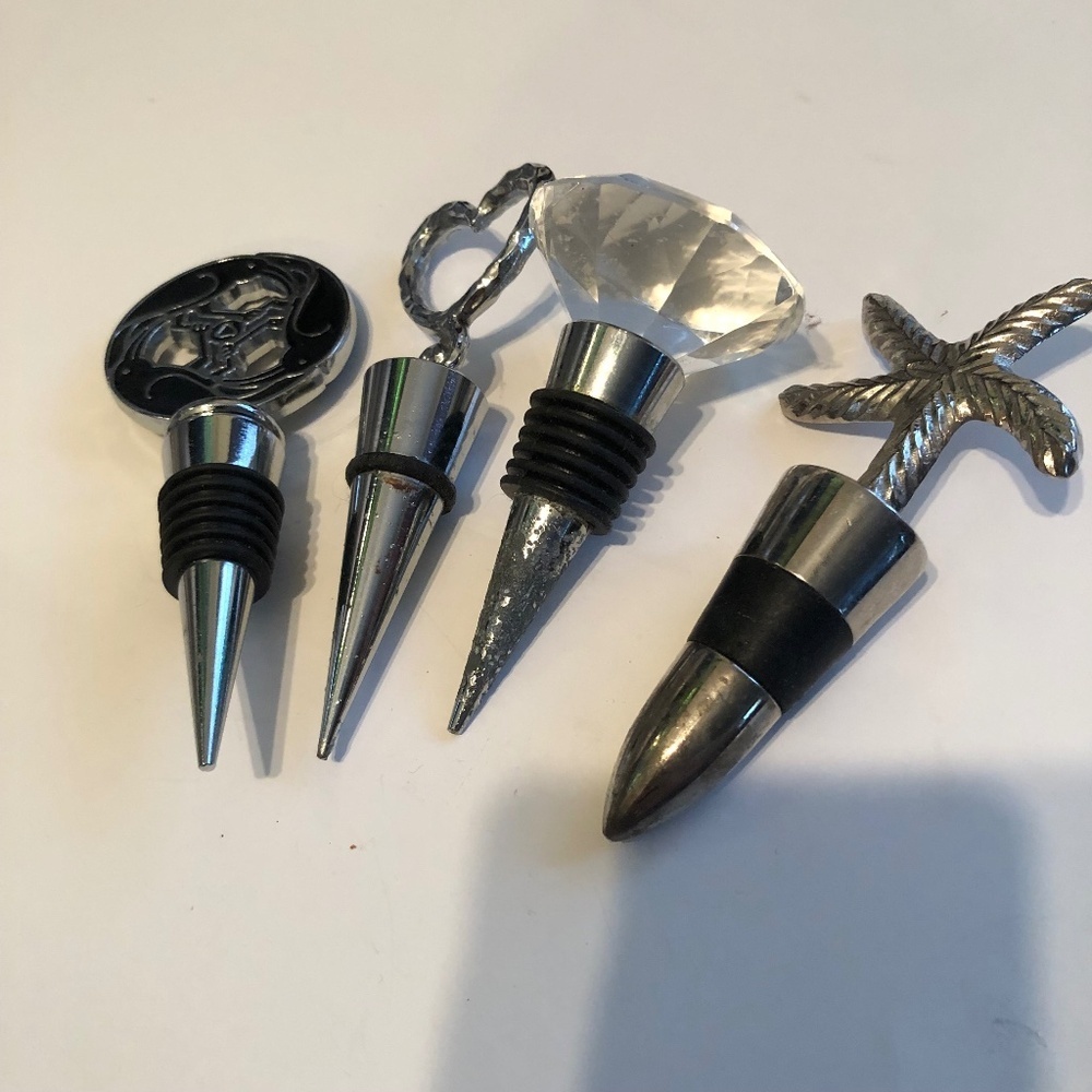 A mix of bottle stoppers to cork your special drinks. Lady or man cave Barware.